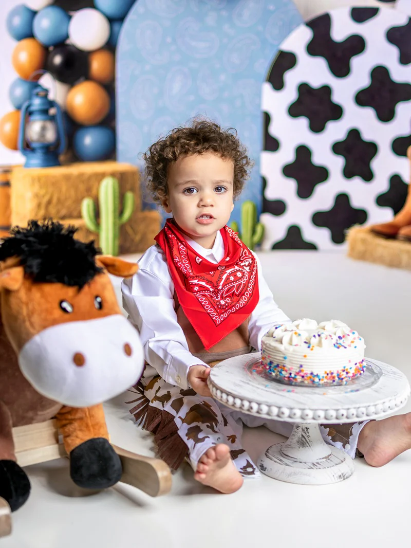 Kate Cake Smash Western Cowboy Boots Blue Backdrop Designed by Ashley Paul - Image 3